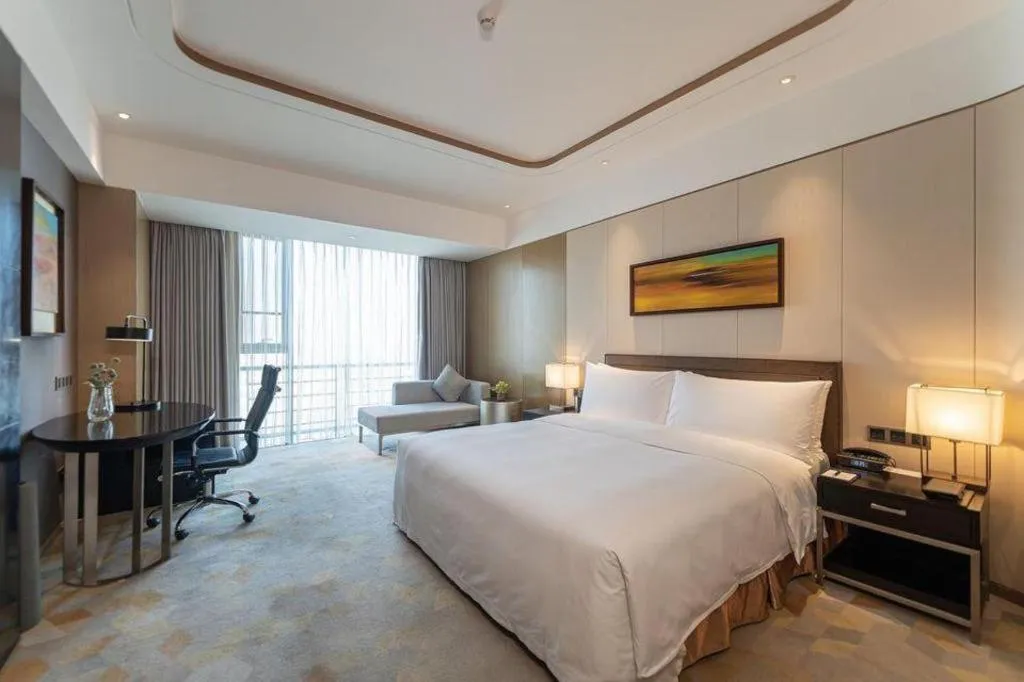 Bed in The QUBE Hotel Jingzhou