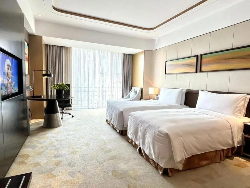 Bed in The QUBE Hotel Jingzhou