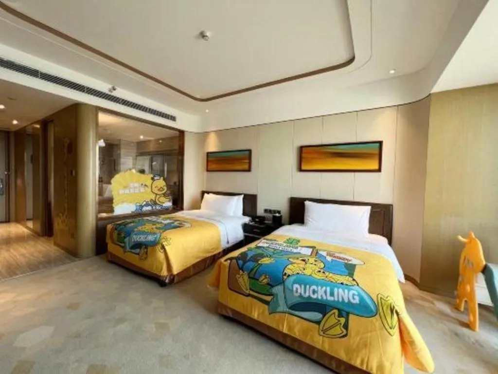 Bed in The QUBE Hotel Jingzhou