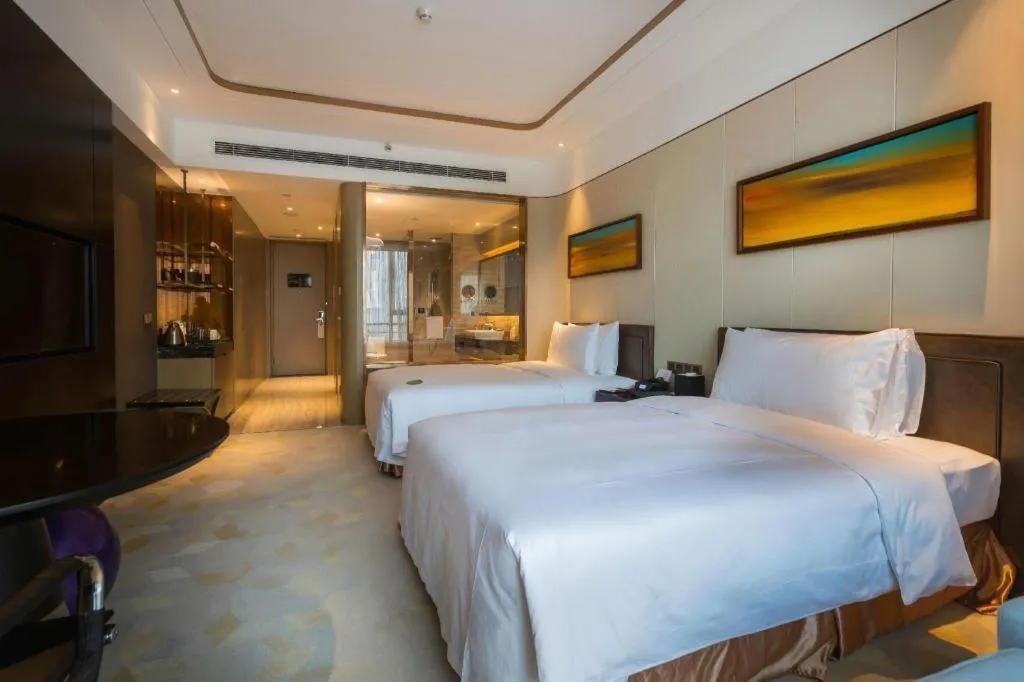 Bed in The QUBE Hotel Jingzhou