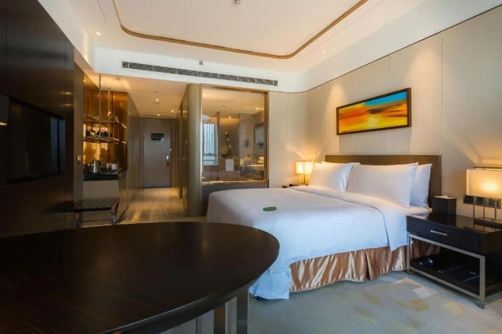 Bed in The QUBE Hotel Jingzhou