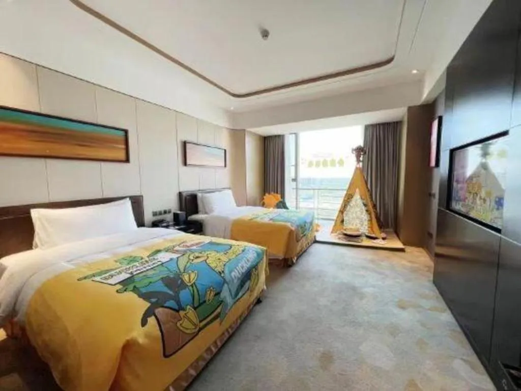 Bed in The QUBE Hotel Jingzhou