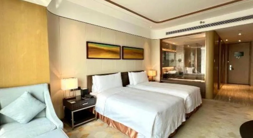 Bed in The QUBE Hotel Jingzhou