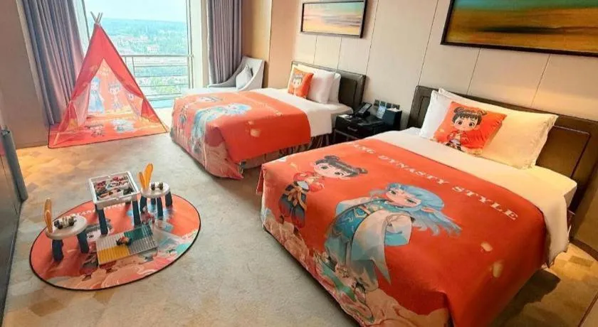 Bed in The QUBE Hotel Jingzhou