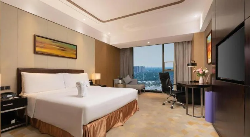 Bed in The QUBE Hotel Jingzhou