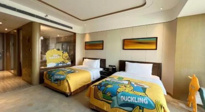 Bed in The QUBE Hotel Jingzhou