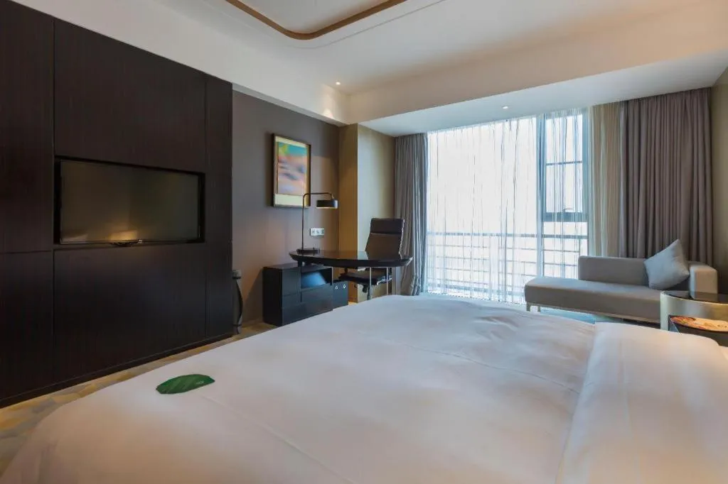 Bed in The QUBE Hotel Jingzhou