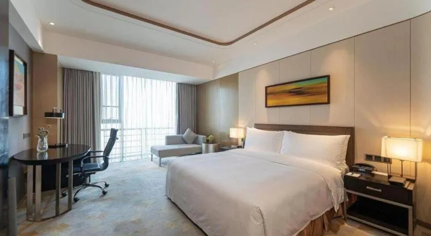 Bed in The QUBE Hotel Jingzhou