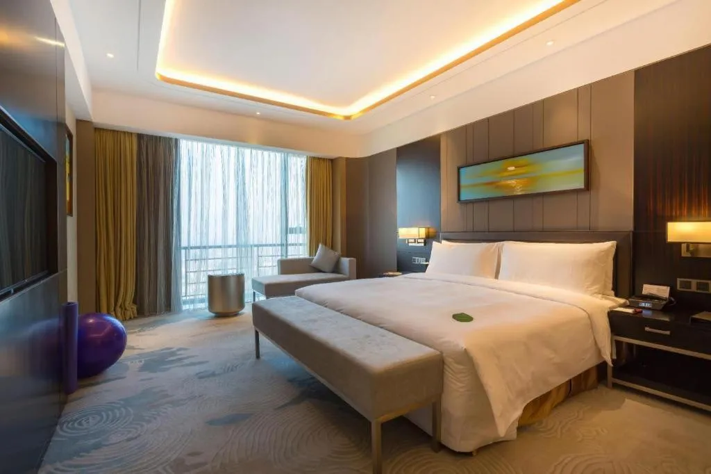 Bed in The QUBE Hotel Jingzhou