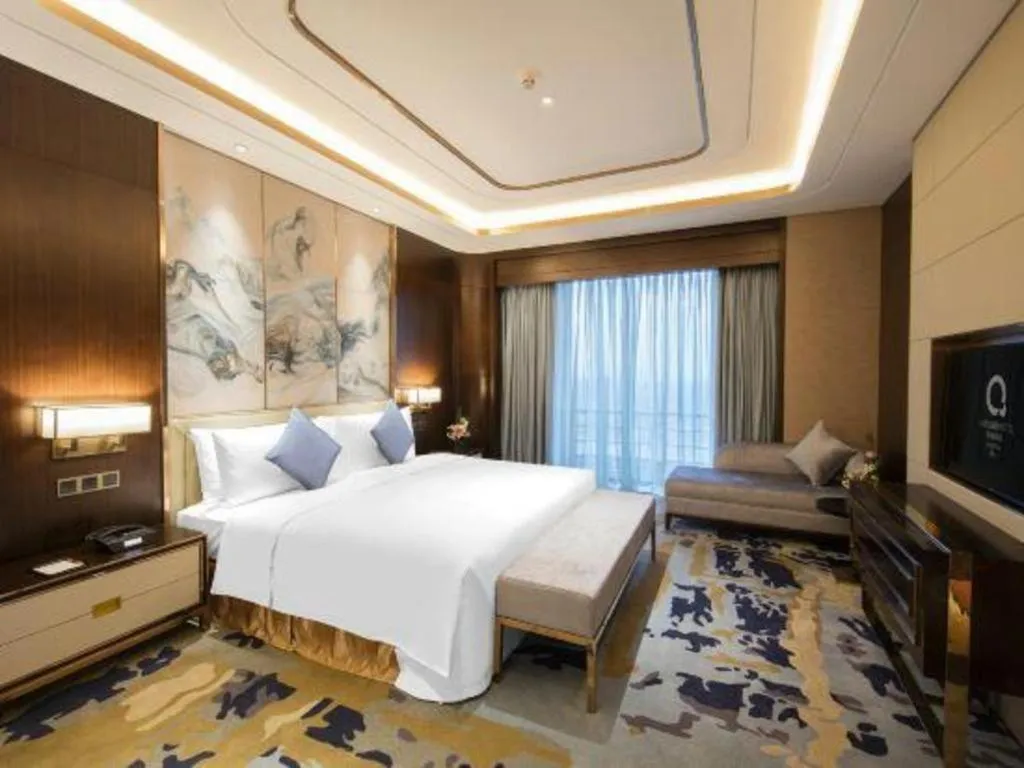 Bed in The QUBE Hotel Jingzhou