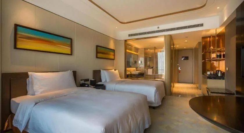 Bed in The QUBE Hotel Jingzhou