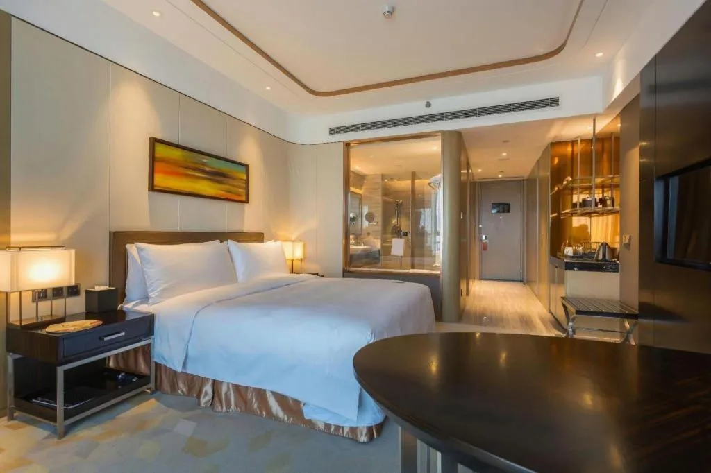 Bed in The QUBE Hotel Jingzhou