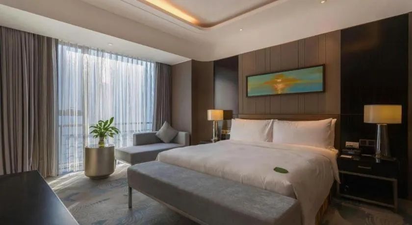 Bed in The QUBE Hotel Jingzhou