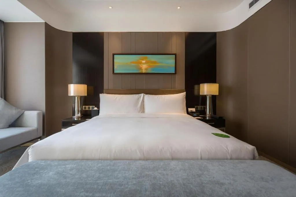 Bed in The QUBE Hotel Jingzhou