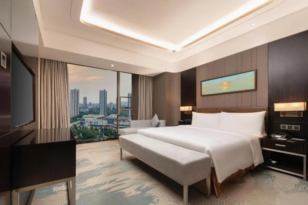 Bed in The QUBE Hotel Jingzhou