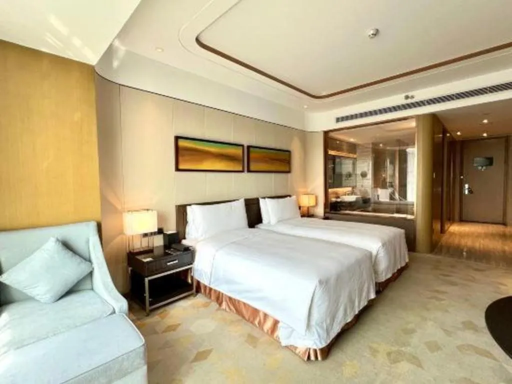 Bed in The QUBE Hotel Jingzhou