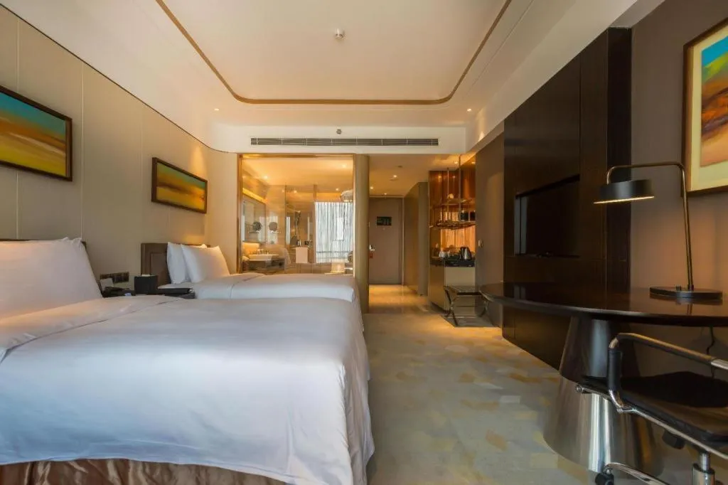 Bed in The QUBE Hotel Jingzhou