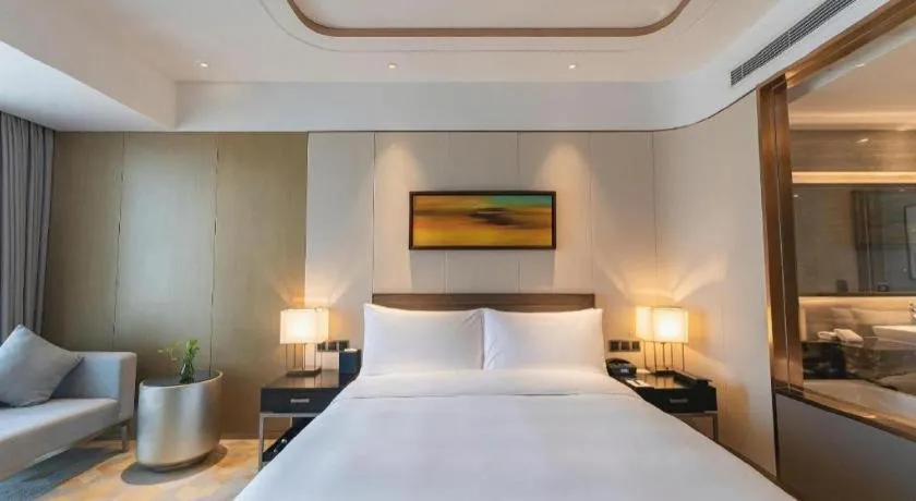 Bed in The QUBE Hotel Jingzhou