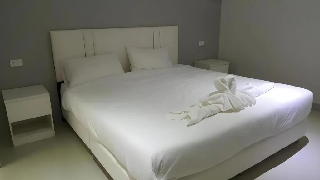 Bed in River Residence Saraburi Hotel