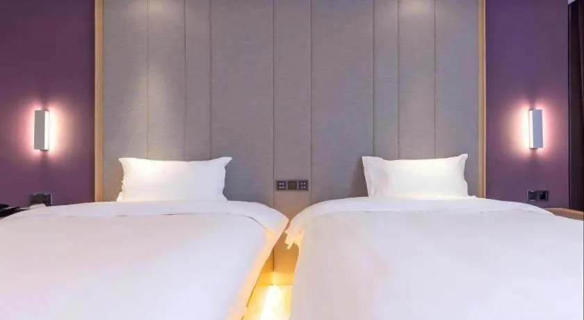 Bed in Lavande Hotels Guangzhou Baiyun Avenue North Metro Station