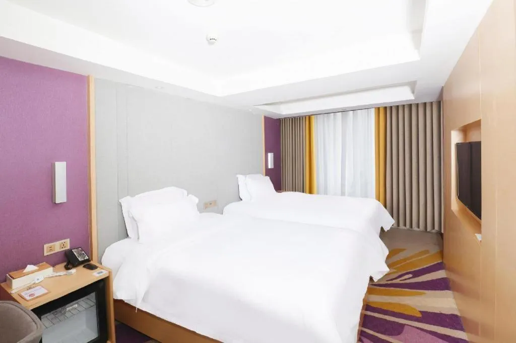 Bed in Lavande Hotels Guangzhou Baiyun Avenue North Metro Station