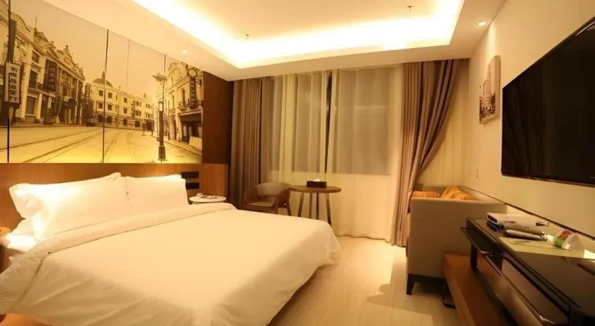 Bed in Jinjiang Metropolo Hotel Shanghai Hongqiao International Exhibition Center Branch