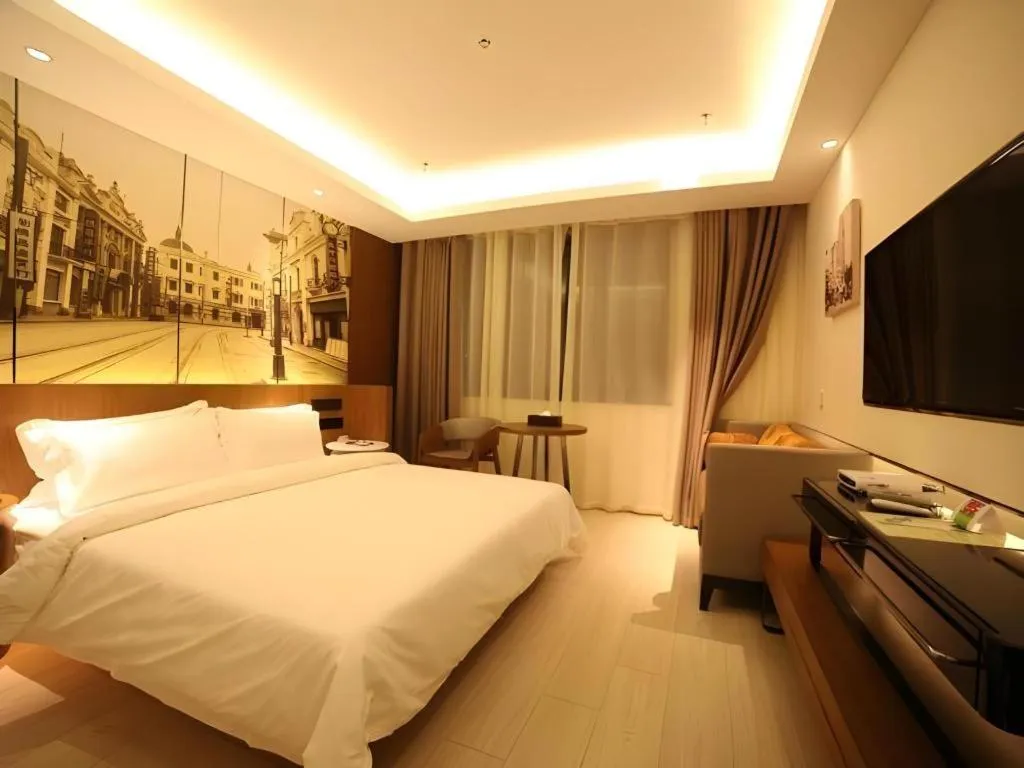 Bed in Jinjiang Metropolo Hotel Shanghai Hongqiao International Exhibition Center Branch