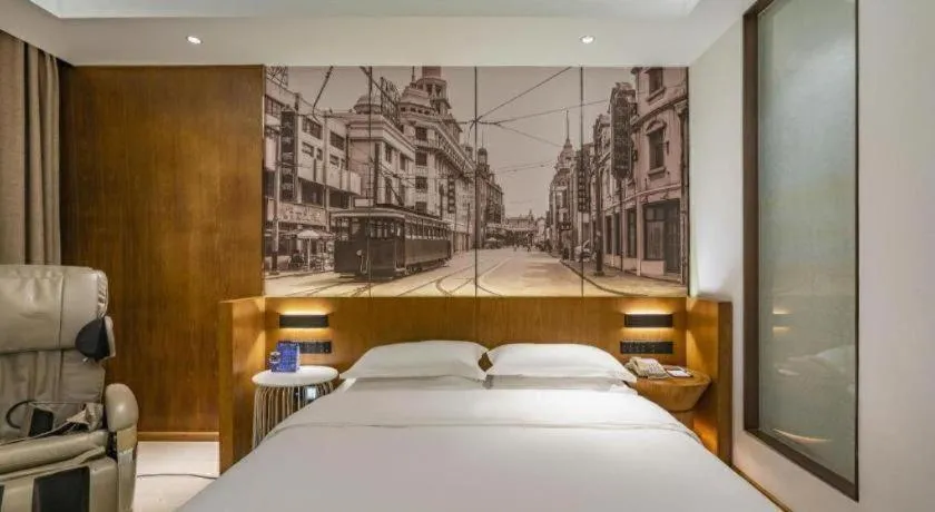 Bed in Jinjiang Metropolo Hotel Shanghai Hongqiao International Exhibition Center Branch