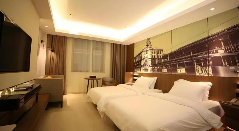 Bed in Jinjiang Metropolo Hotel Shanghai Hongqiao International Exhibition Center Branch