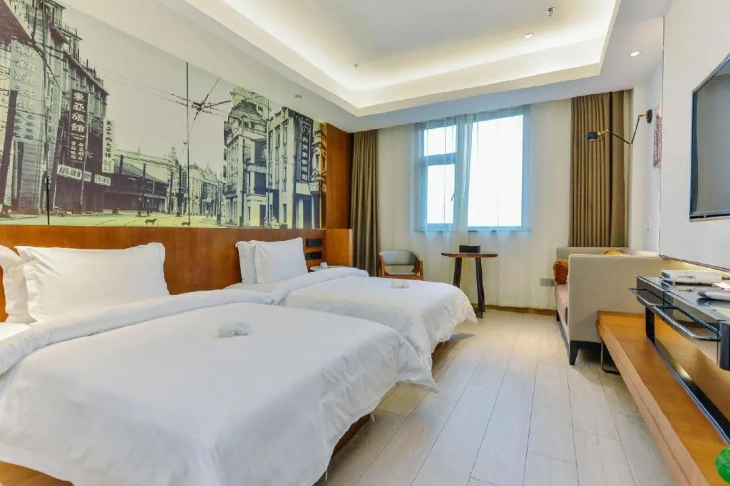 Bed in Jinjiang Metropolo Hotel Shanghai Hongqiao International Exhibition Center Branch