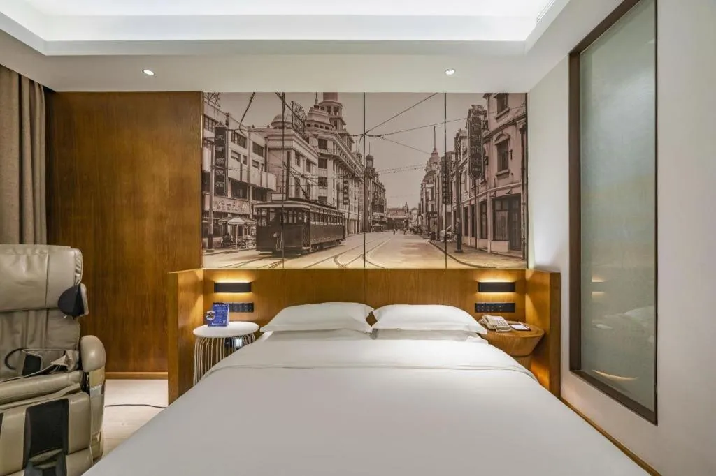Bed in Jinjiang Metropolo Hotel Shanghai Hongqiao International Exhibition Center Branch