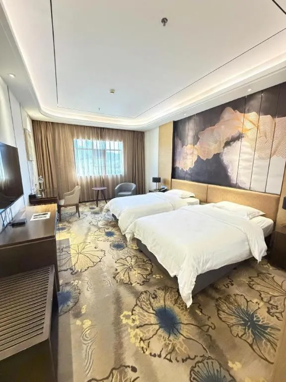 Bed in The Bmc Hotel