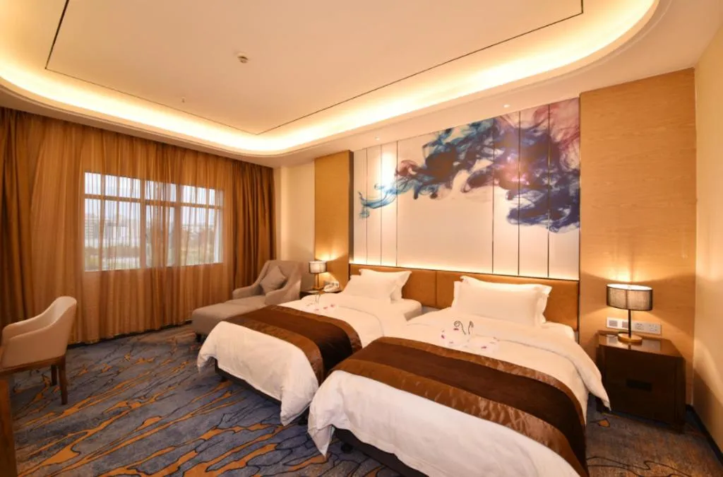 Bed in The Bmc Hotel