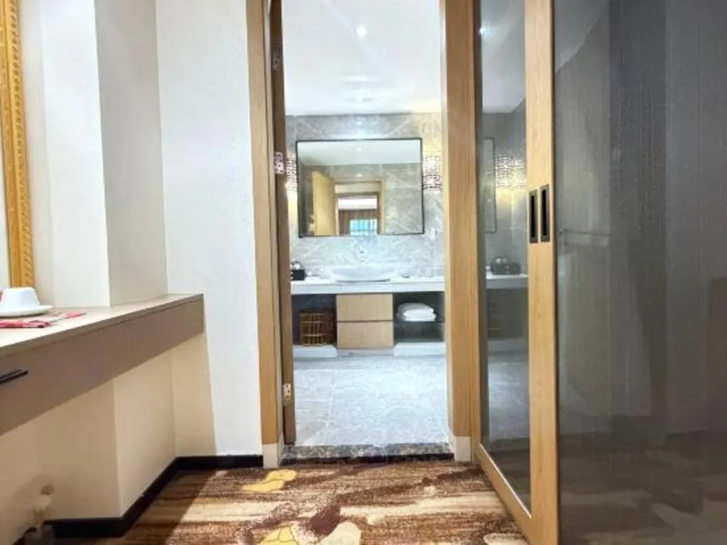 Bed in The Bmc Hotel