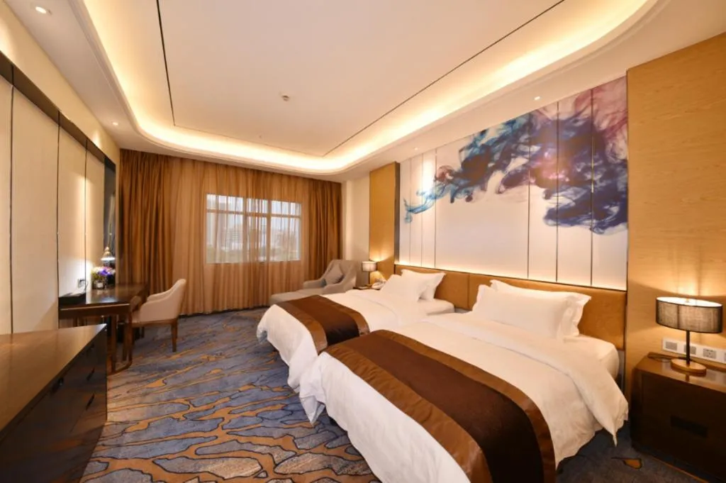 Bed in The Bmc Hotel