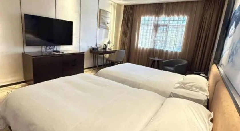 Bed in The Bmc Hotel