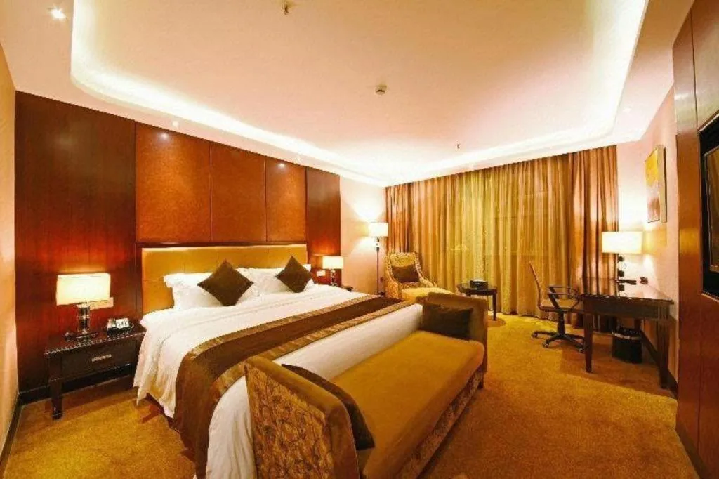 Bed in The Bmc Hotel