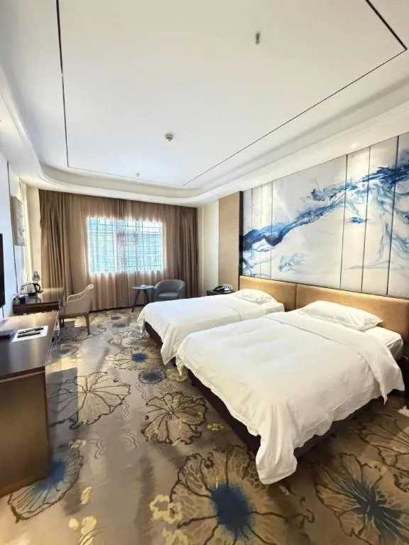 Bed in The Bmc Hotel