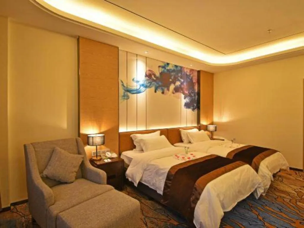 Bed in The Bmc Hotel