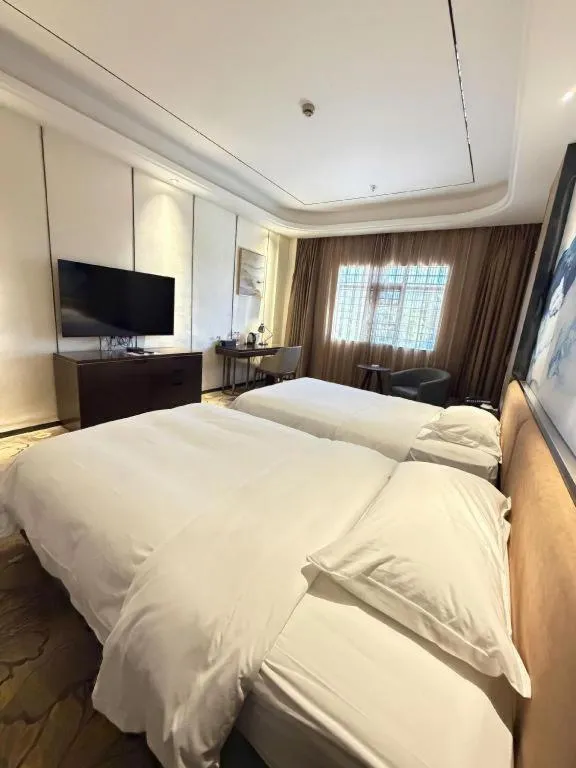 Bed in The Bmc Hotel