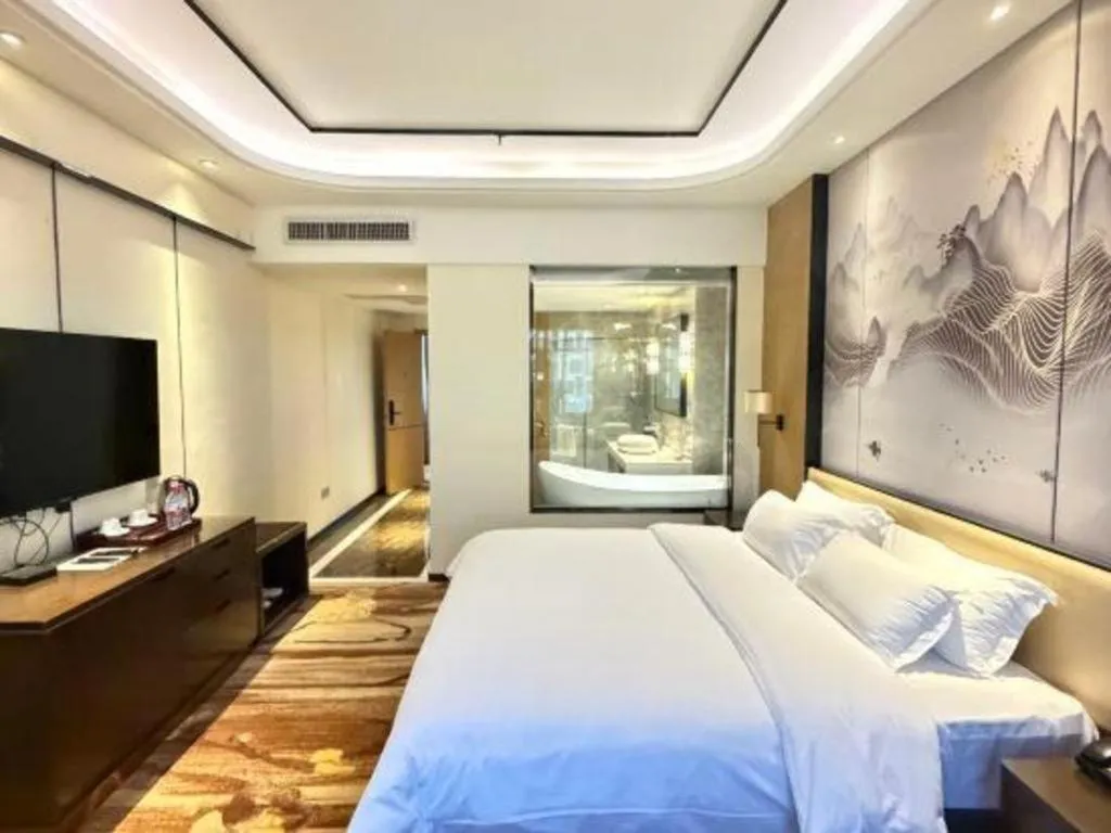 Bed in The Bmc Hotel