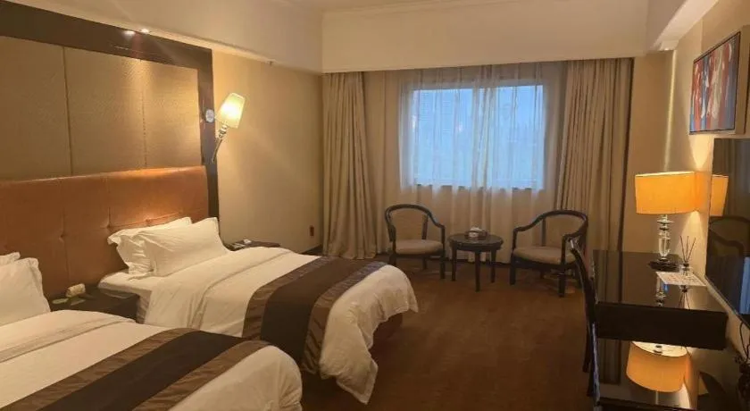 Bed in The Bmc Hotel