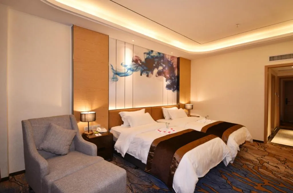 Bed in The Bmc Hotel