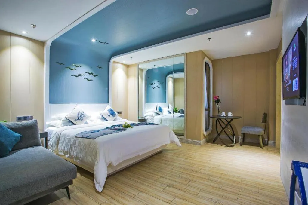 Bed in HuangMa holiday yacht view sea resort hotel
