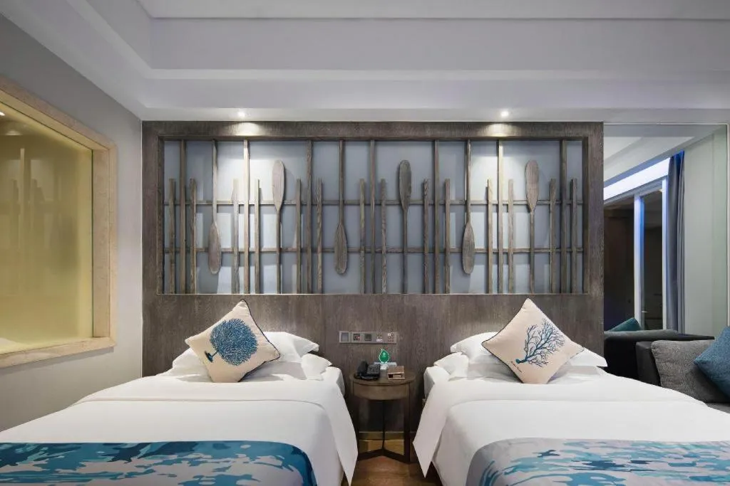 Bed in HuangMa holiday yacht view sea resort hotel