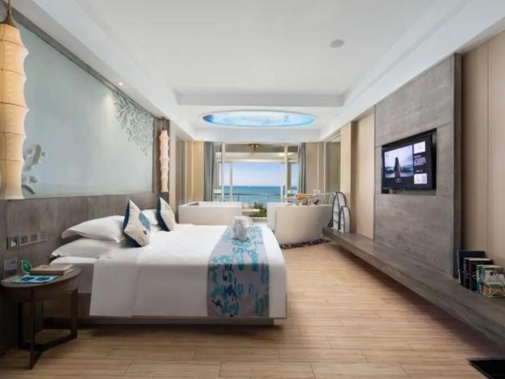 Bed in HuangMa holiday yacht view sea resort hotel