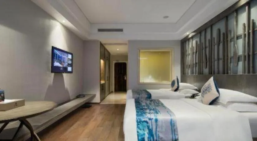 Bed in HuangMa holiday yacht view sea resort hotel