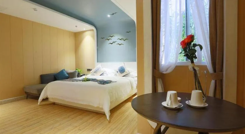 Bed in HuangMa holiday yacht view sea resort hotel