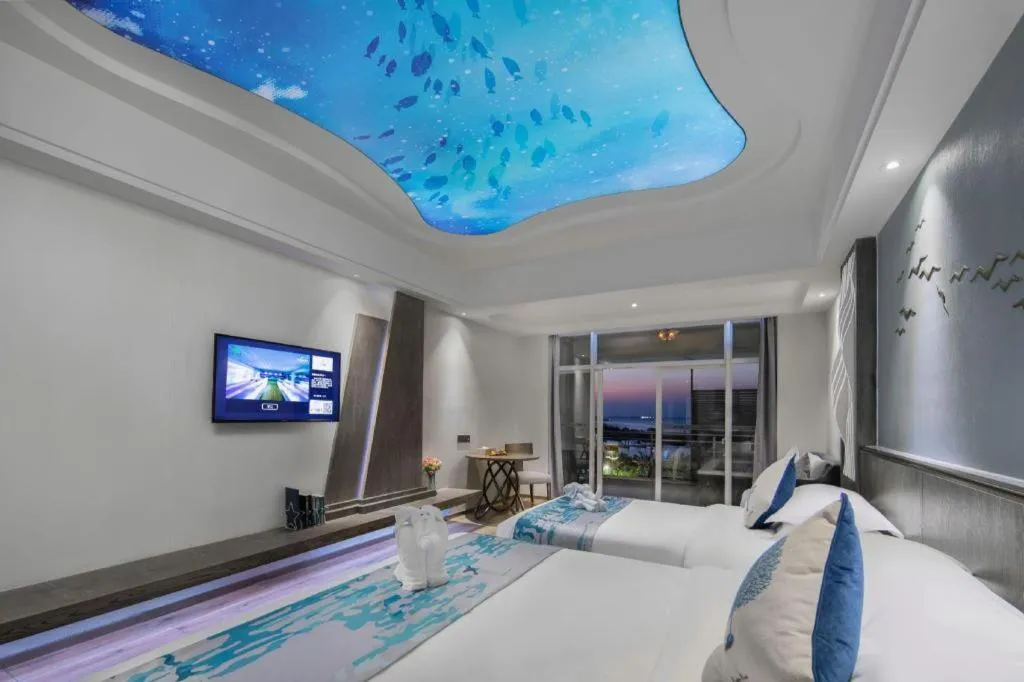 Bed in HuangMa holiday yacht view sea resort hotel