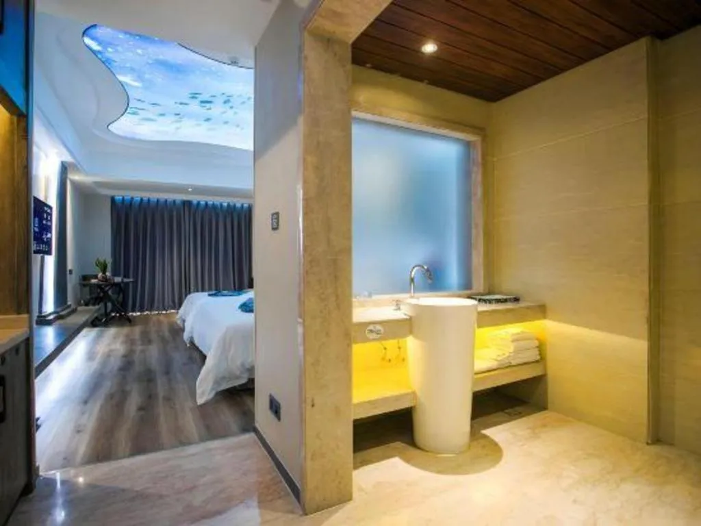 Bed in HuangMa holiday yacht view sea resort hotel